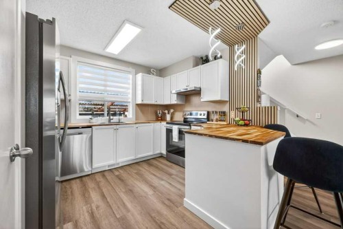 370 Prestwick Circle Se, Calgary, AB - Indoor Photo Showing Kitchen With Stainless Steel Kitchen