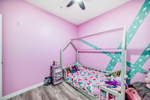 101-117 Copperpond Common Se, Calgary, AB - Indoor Photo Showing Bedroom