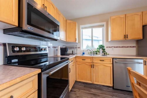 35 Somervale Place Sw, Calgary, AB - Indoor Photo Showing Kitchen With Stainless Steel Kitchen With Double Sink