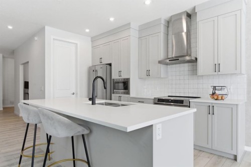 54 Belmont Manor Sw, Calgary, AB - Indoor Photo Showing Kitchen With Double Sink With Upgraded Kitchen