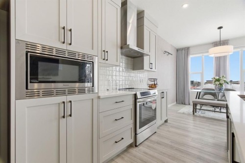 54 Belmont Manor Sw, Calgary, AB - Indoor Photo Showing Kitchen With Upgraded Kitchen