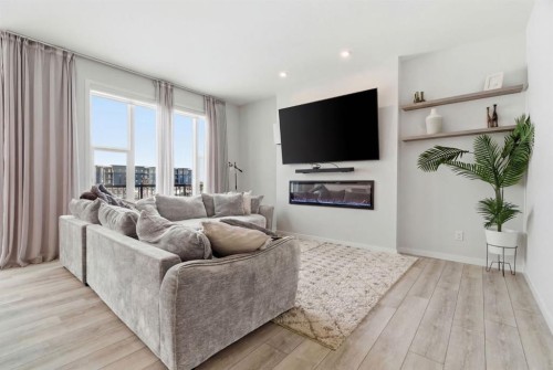 54 Belmont Manor Sw, Calgary, AB - Indoor Photo Showing Living Room