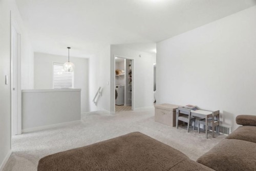 54 Belmont Manor Sw, Calgary, AB - Indoor Photo Showing Other Room