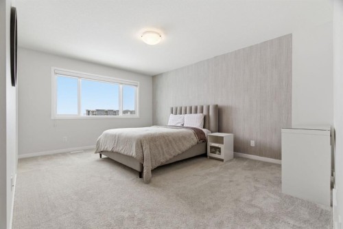 54 Belmont Manor Sw, Calgary, AB - Indoor Photo Showing Bedroom