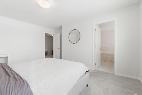 54 Belmont Manor Sw, Calgary, AB - Indoor Photo Showing Bedroom