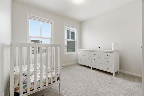 54 Belmont Manor Sw, Calgary, AB - Indoor Photo Showing Bedroom