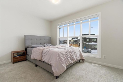 54 Belmont Manor Sw, Calgary, AB - Indoor Photo Showing Bedroom