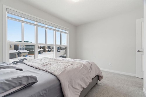 54 Belmont Manor Sw, Calgary, AB - Indoor Photo Showing Bedroom