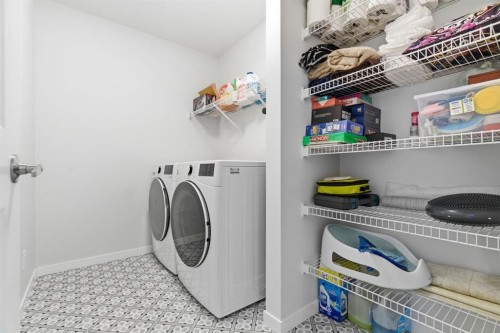 54 Belmont Manor Sw, Calgary, AB - Indoor Photo Showing Laundry Room