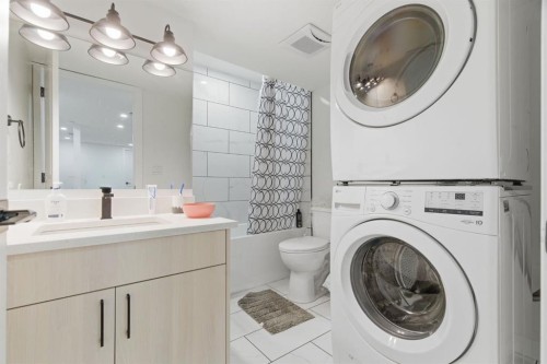 54 Belmont Manor Sw, Calgary, AB - Indoor Photo Showing Laundry Room