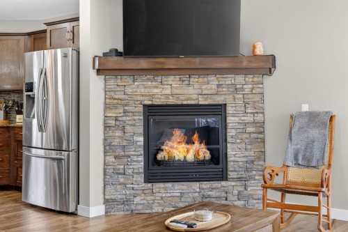 180 Walden Gate Se, Calgary, AB - Indoor Photo Showing Living Room With Fireplace