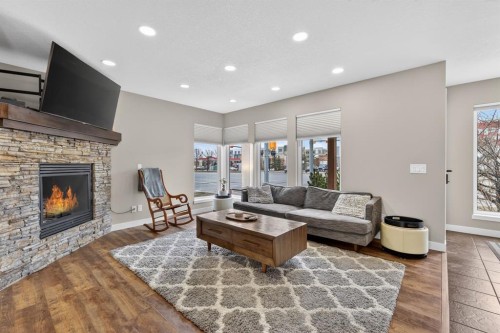 180 Walden Gate Se, Calgary, AB - Indoor Photo Showing Living Room With Fireplace
