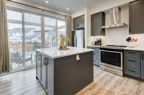 146 Magnolia Square Se, Calgary, AB - Indoor Photo Showing Kitchen With Upgraded Kitchen