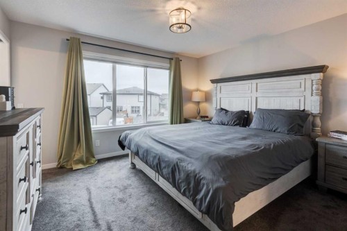 146 Magnolia Square Se, Calgary, AB - Indoor Photo Showing Bedroom