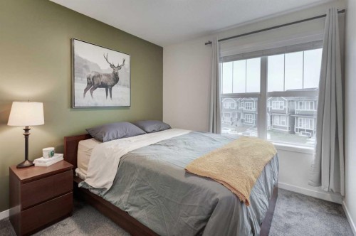 146 Magnolia Square Se, Calgary, AB - Indoor Photo Showing Bedroom