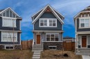 146 Magnolia Square Se, Calgary, AB  - Outdoor With Facade 