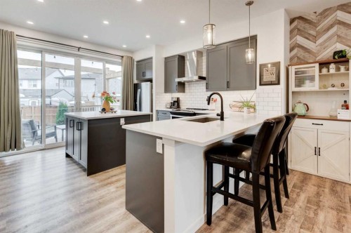 146 Magnolia Square Se, Calgary, AB - Indoor Photo Showing Kitchen With Upgraded Kitchen