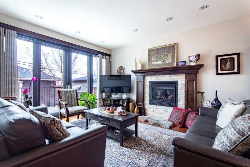 2028 25A Street Sw, Calgary, AB - Indoor Photo Showing Living Room With Fireplace