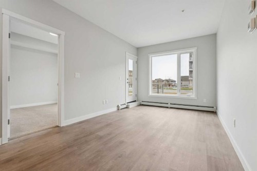 103-655 Shawnee Square Sw, Calgary, AB - Indoor Photo Showing Other Room