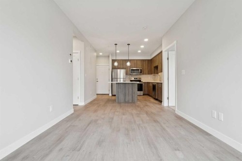 103-655 Shawnee Square Sw, Calgary, AB - Indoor Photo Showing Kitchen