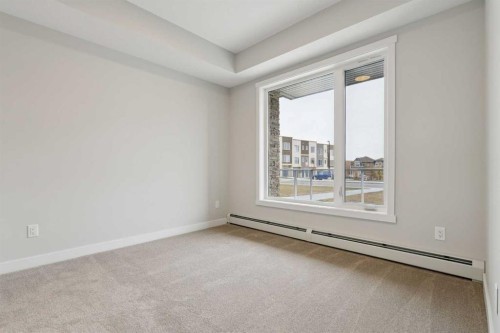 103-655 Shawnee Square Sw, Calgary, AB - Indoor Photo Showing Other Room