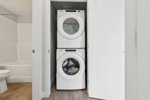 103-655 Shawnee Square Sw, Calgary, AB - Indoor Photo Showing Laundry Room