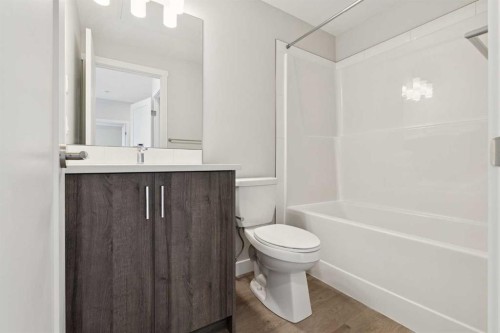 103-655 Shawnee Square Sw, Calgary, AB - Indoor Photo Showing Bathroom