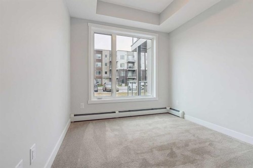 103-655 Shawnee Square Sw, Calgary, AB - Indoor Photo Showing Other Room