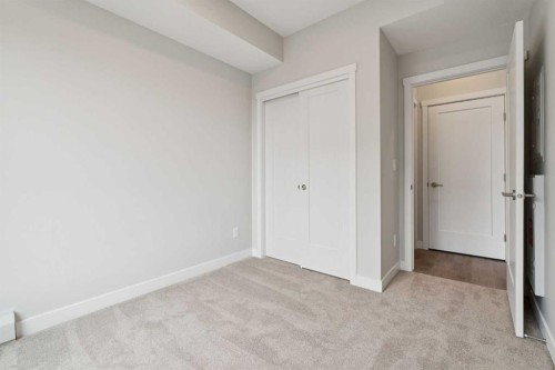 103-655 Shawnee Square Sw, Calgary, AB - Indoor Photo Showing Other Room