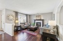 18519 Chaparral Manor Se, Calgary, AB  - Indoor Photo Showing Living Room With Fireplace 