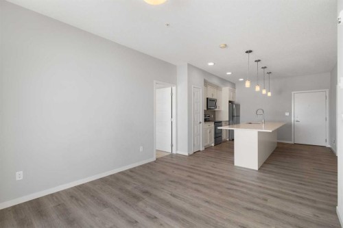 305-20 Seton Park Se, Calgary, AB - Indoor Photo Showing Kitchen
