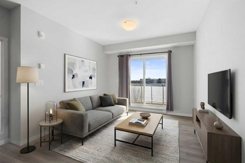 305-20 Seton Park Se, Calgary, AB - Indoor Photo Showing Living Room