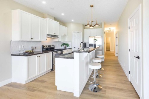 42 Royal Crest Point Nw, Calgary, AB - Indoor Photo Showing Kitchen With Upgraded Kitchen