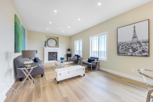 42 Royal Crest Point Nw, Calgary, AB - Indoor Photo Showing Living Room With Fireplace
