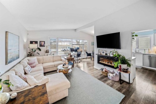 5516 Taylor Crescent Ne, Calgary, AB - Indoor Photo Showing Living Room With Fireplace