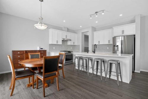 154 Yorkstone Way Sw, Calgary, AB - Indoor Photo Showing Kitchen With Stainless Steel Kitchen With Upgraded Kitchen