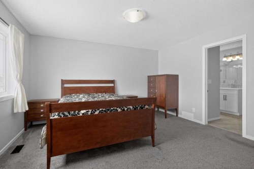 154 Yorkstone Way Sw, Calgary, AB - Indoor Photo Showing Bedroom