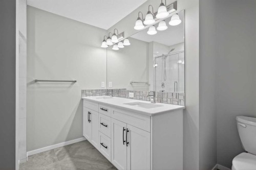 154 Yorkstone Way Sw, Calgary, AB - Indoor Photo Showing Bathroom