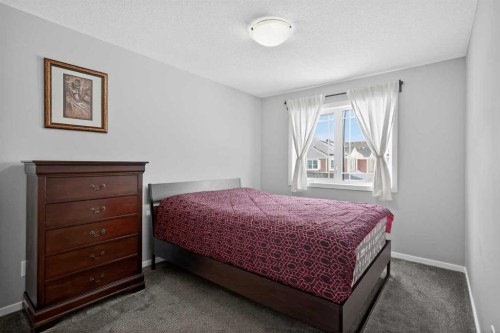 154 Yorkstone Way Sw, Calgary, AB - Indoor Photo Showing Bedroom