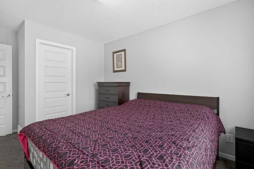 154 Yorkstone Way Sw, Calgary, AB - Indoor Photo Showing Bedroom