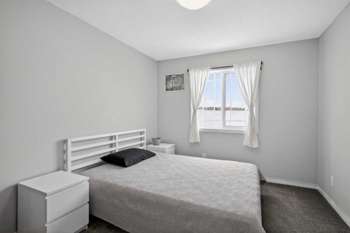 154 Yorkstone Way Sw, Calgary, AB - Indoor Photo Showing Bedroom