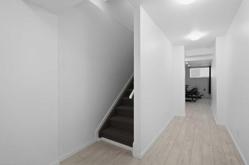 154 Yorkstone Way Sw, Calgary, AB - Indoor Photo Showing Other Room