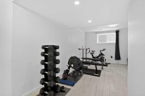 154 Yorkstone Way Sw, Calgary, AB - Indoor Photo Showing Gym Room