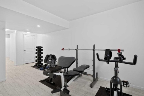 154 Yorkstone Way Sw, Calgary, AB - Indoor Photo Showing Gym Room