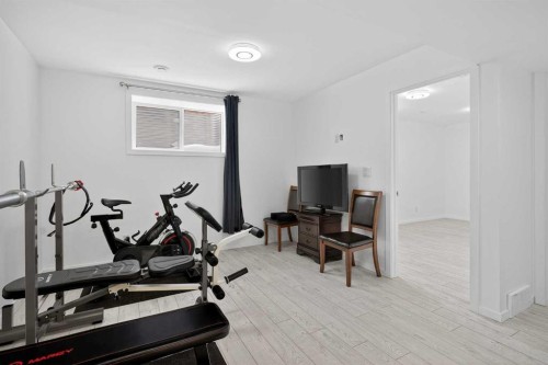 154 Yorkstone Way Sw, Calgary, AB - Indoor Photo Showing Gym Room