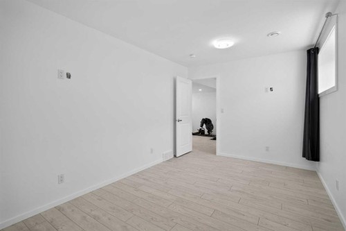 154 Yorkstone Way Sw, Calgary, AB - Indoor Photo Showing Other Room