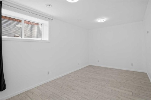 154 Yorkstone Way Sw, Calgary, AB - Indoor Photo Showing Other Room