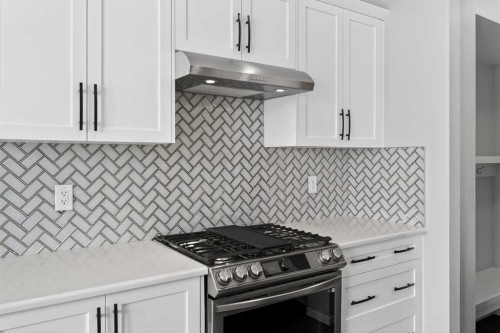 154 Yorkstone Way Sw, Calgary, AB - Indoor Photo Showing Kitchen With Upgraded Kitchen