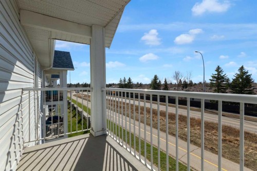 308-2000 Valleyview Park Se, Calgary, AB - Outdoor With Balcony With Exterior