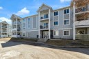 308-2000 Valleyview Park Se, Calgary, AB  - Outdoor With Balcony With Facade 